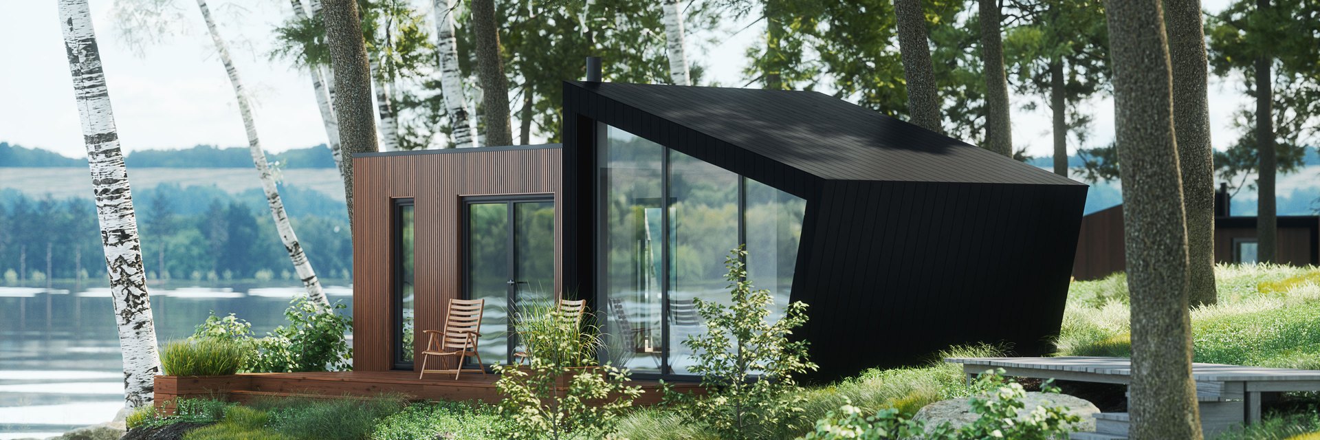 Glamping-Haus am Seeufer zwischen Birken: dunkel verschalter, keilf&ouml;rmiger Bauk&ouml;rper mit raumhoher Verglasung und vorgelagerter Holzterrasse
